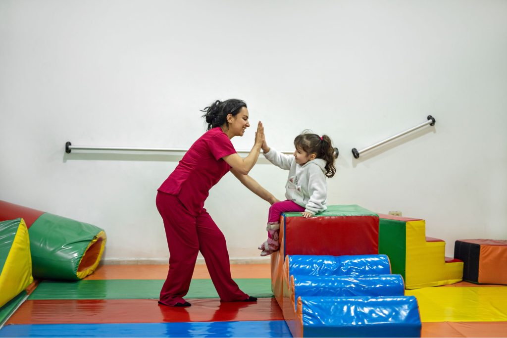 Pediatric occupational therapist working with a child occupational therapy patient